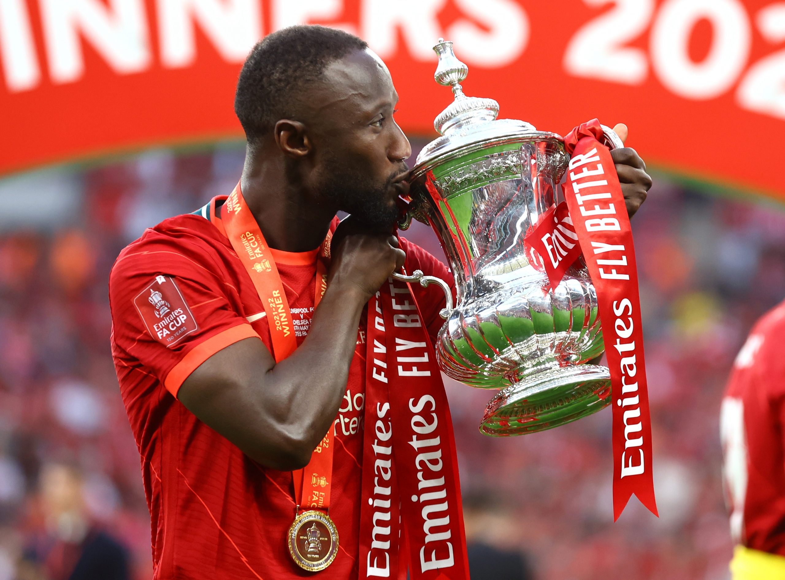 Liverpool's Naby Keita celebrates with the trophy after winning the FA Cup final