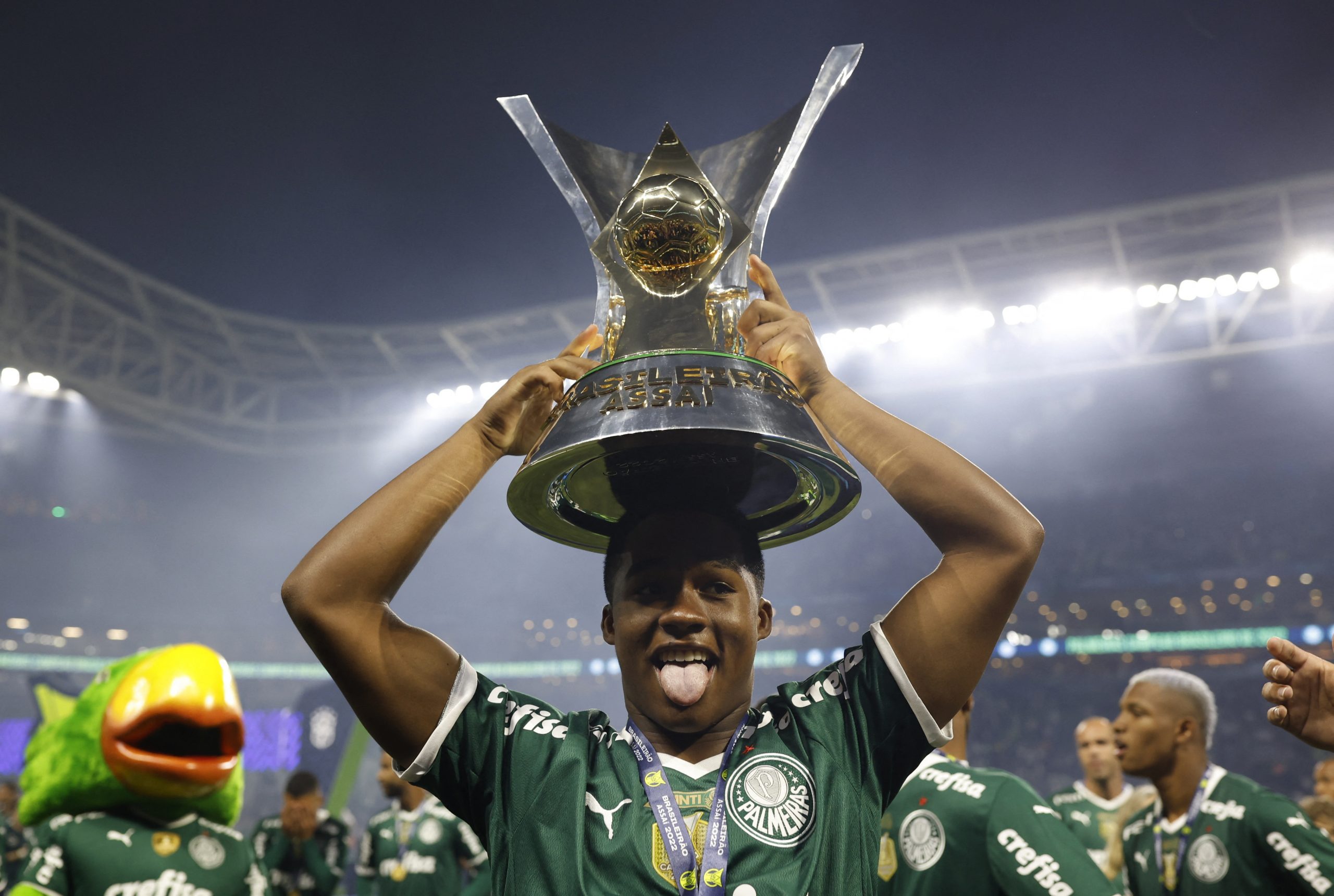 Palmeiras' Endrick celebrates with the trophy after winning the Brasileiro Championship