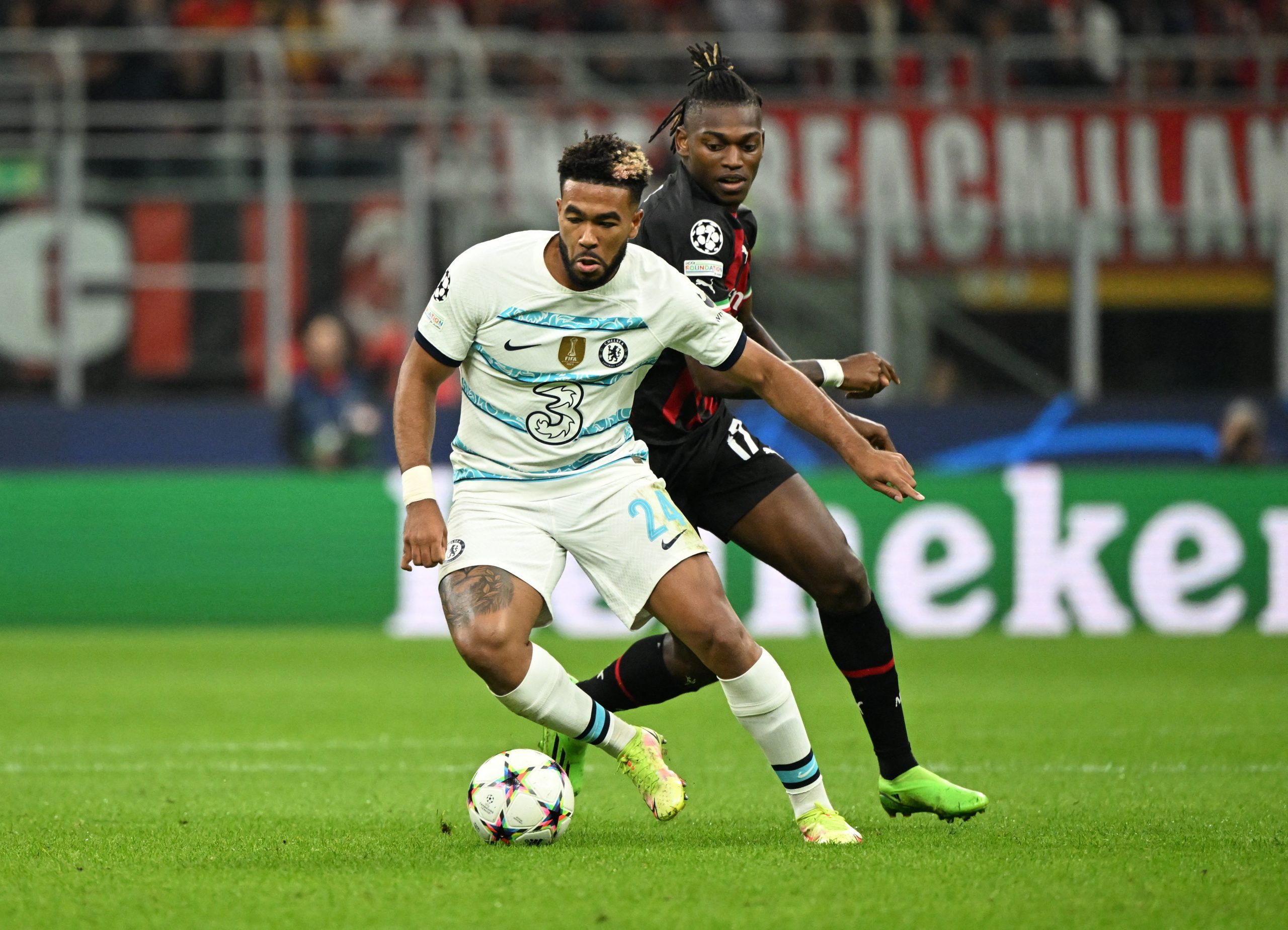 Reece James in action with AC Milan's Rafael Leao